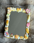 Pompom mirror
